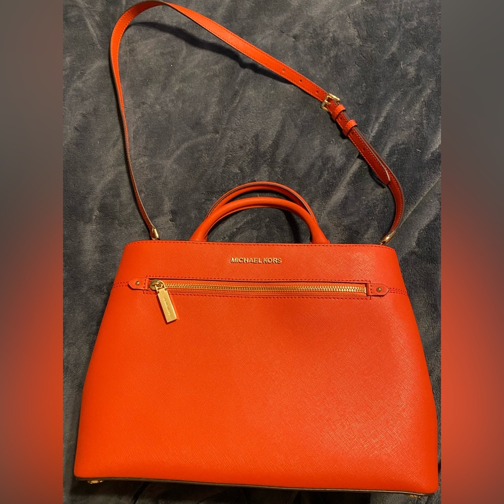 Michael Kors- leather satchel. Lt terractta/burnt orange color. Great condition!